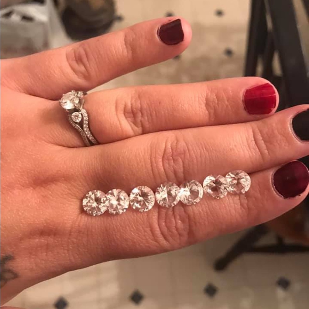 Genuine earth mined white sapphires 2carats each
